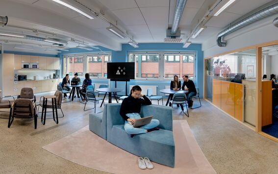 Office and common spaces in A Grid