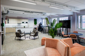 Open area and kitchen in A Grid's coworking space